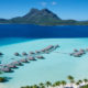 BORA BORA PEARL BEACH RESORT & SPA view of floating villas and volcano